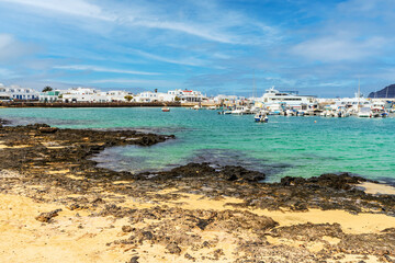 Beach and port in Caleta del Sebo, La Graciosa, Canary Islands, Spain