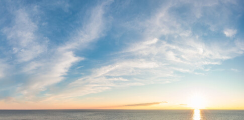 Fototapeta na wymiar Dramatic Colorful Sunset Sky over Mediterranean Sea. Cloudscape Nature Background.