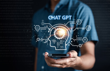 Fototapeta Businessman using chatbot in smartphone intelligence Ai.Chat GPT Chat with AI Artificial Intelligence, developed by OpenAI generate. Futuristic technology, robot in online system. obraz