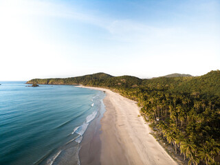 Beautiful beach with blue water and palmtrees in Philippines Asia