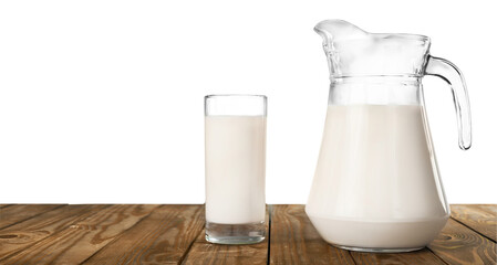 Milk Jug and Glass Standing on the