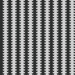 Black and white strips knitted jacquard seamless pattern for interior design. Monochrome geometric vector illustration.