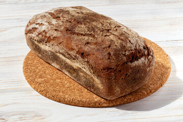 Dark bread on a round board
