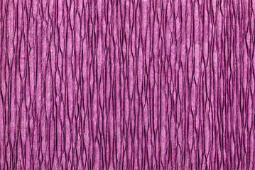 Texture of crepe paper in purple or pink color. Decor paper
