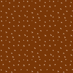 cute, light crosses on a brown background