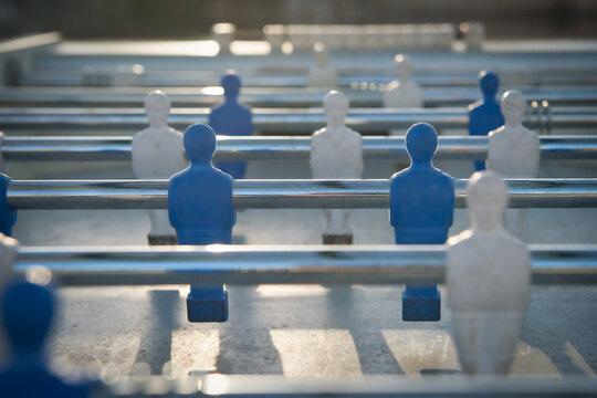 Full frame close-up of plastic figurines on a foosball table