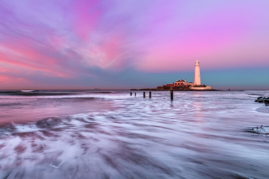 Lighthouse at sunset on the Northumberland coastline