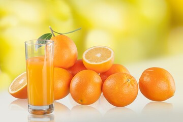 Fresh juicy citrus fruits on wooden desk