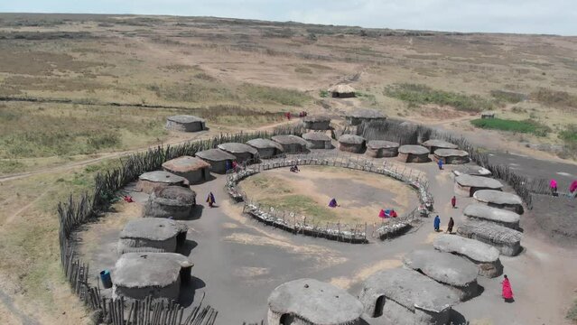Masai Mara african tribe village in the Serengeti National Park by drone, Tanzania, East-Africa.
