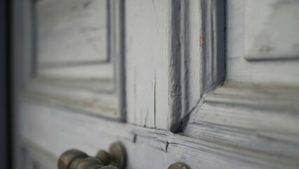 Old antique door texture background with doorknob