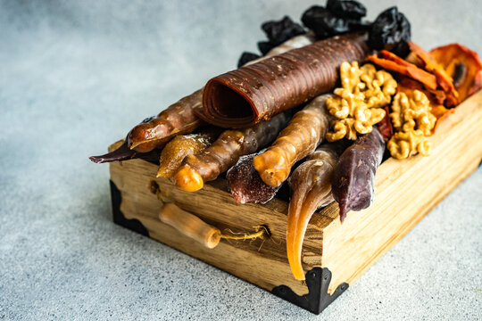 Traditional Georgian churchkhela, tklapi and gozinaki with assorted dried fruits and nuts