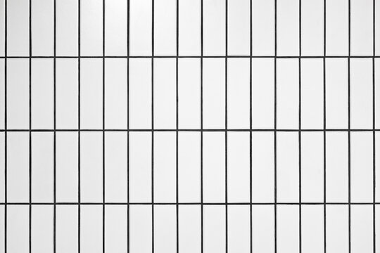 White tiled wall background