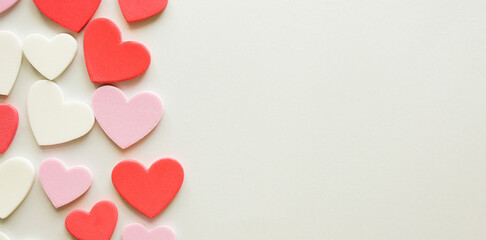 close up top view on colorful heart shape on white color background for donation charity and valentine festival concept