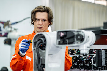 Fototapeta premium Team of engineers practicing maintenance Taking care and practicing maintenance of machines in the factory so that they can be used continuously.