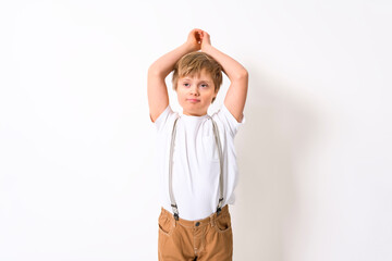 child boy posing on studio white background