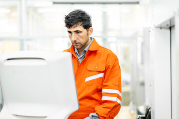 Fototapeta premium Team of engineers practicing maintenance Taking care and practicing maintenance of machines in the factory so that they can be used continuously.