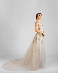 Fototapeta na wymiar a model in an elegant evening dress dress