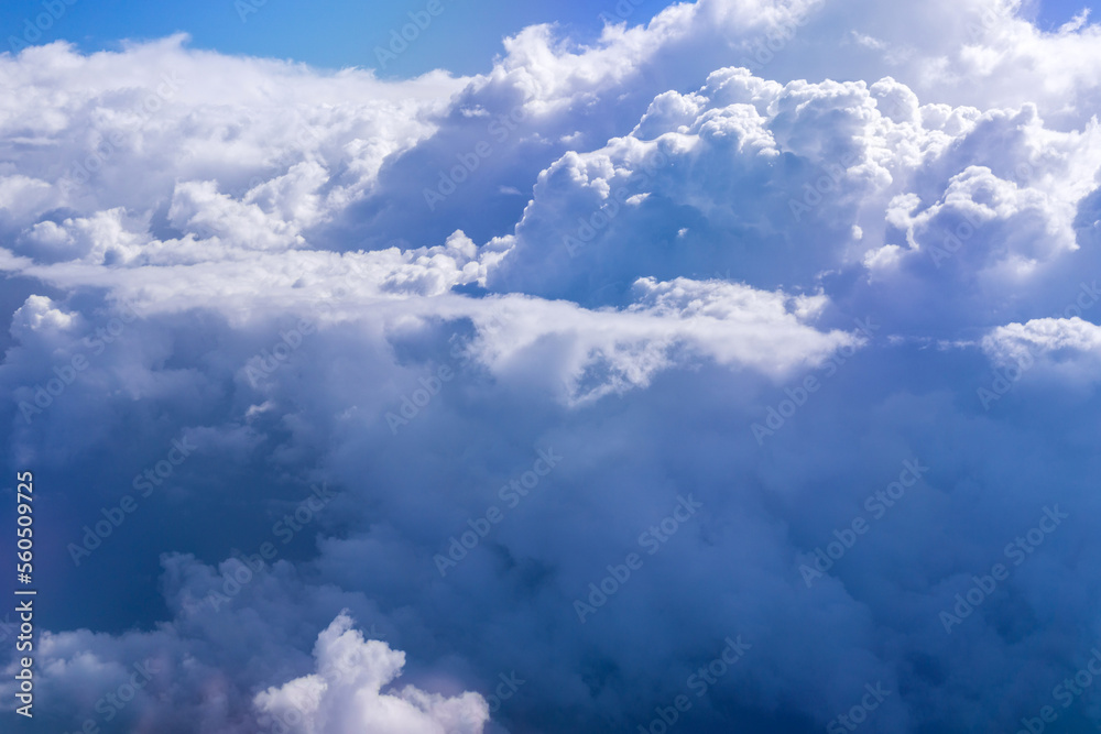 Wall mural clouds view from the plane. clouds are moving on camera. flying through the cloud. travel by air. pe