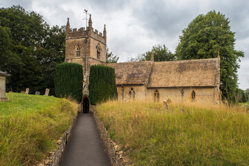 Fototapeta na wymiar Old English Church in the countryside in the Cotswolds