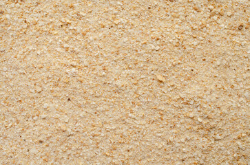 Heap of breadcrumbs, background, top view. Heap of dry breadcrumbs, background, texture, top view. Pile of breadcrumbs for nuggets, panko, top view. Breadcrumbs, background, texture.