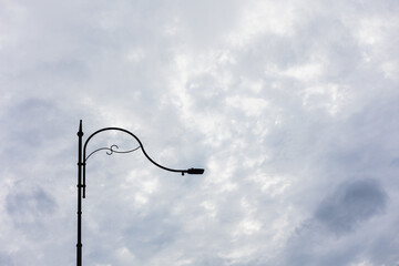 Street lamp on blue sky background