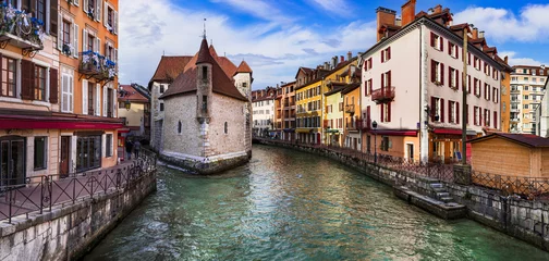 Poster France travel and landmarks. Romantic beautiful old town of Annecy with colorful houses and canals. Haute-Savoi region © Freesurf