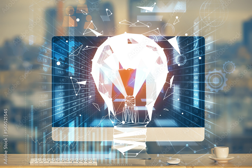 Poster Computer on desktop in office with bulb icon hologram. Multi exposure. Concept of idea.