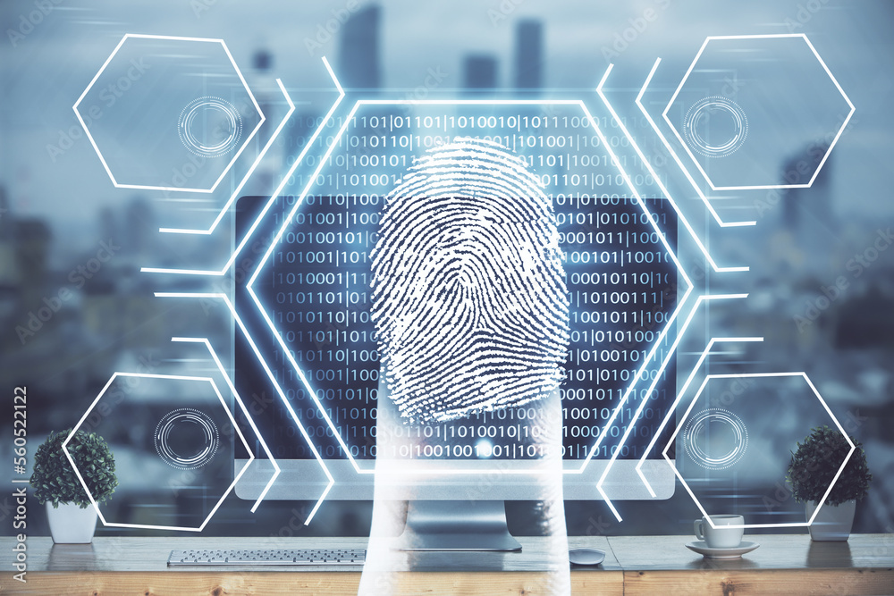 Poster Computer on desktop in office with finger print drawing. Double exposure. Concept of business data security.
