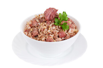 Canned rice porridge with meat and parsley in a bowl