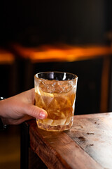 whisky on the rocks on wood