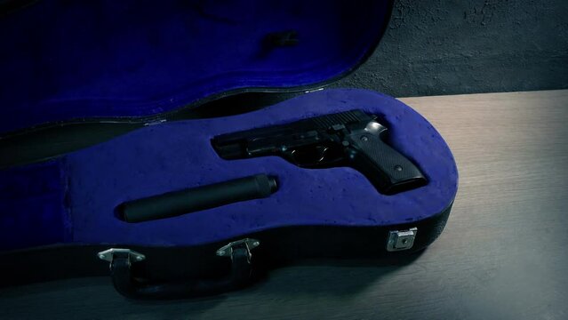 Spy Opens Violin Case With Gun Inside
