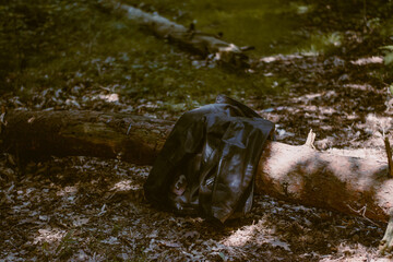 Leather Jacket in the forest, abandoned 
