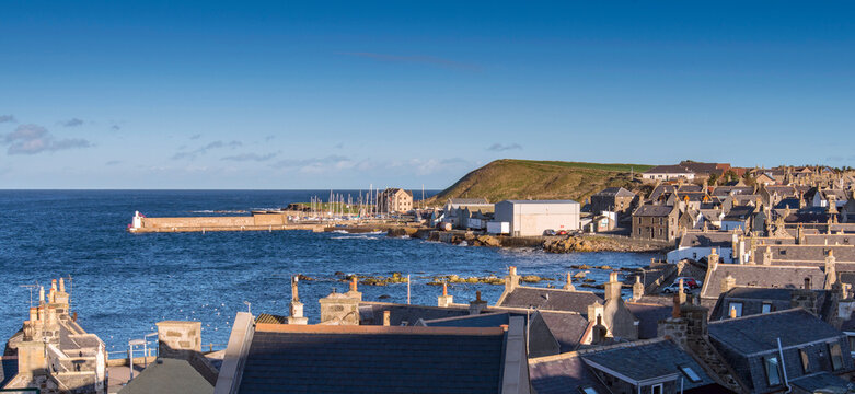 A view across the rooftops of Whitehills towards the harbour