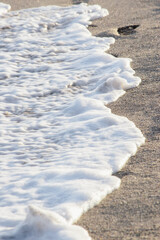 espuma a la orilla del mar