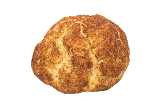 Tasty cinnamon cookies on naplin over wooden table.