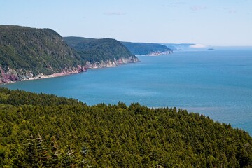 Low fog on the horizon. Fox Rock lookout in St. Martins, New Brunswick.