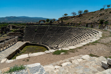 Fototapeta na wymiar Ruins of Roman theater in Aphrodisias old greek city in Geyre, Aydin, Turkey. 