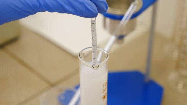 Laboratory scientific reseach. Liquid density measurement. Chemical reaction. Testing samples. Scientist Examining Agriculture In Botanical Lab. Geological chemical laboratory. 4 k video