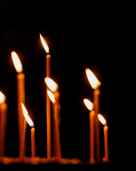 soft selective focus, church candles in temple, faith and religion for Christians and Catholics. light in dark for prayer and meditation, spiritual development and improvement.