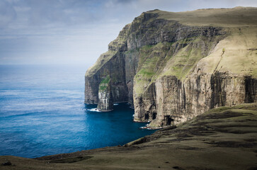 Ásmundarstakkur, bird cliffs, sea stack and rock formation in Suduroy, Faroe Islands, Northern Europe
