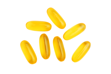 Yellow capsules of omega-3, fatty acid pills, nutritional supplement, isolated on transparent background