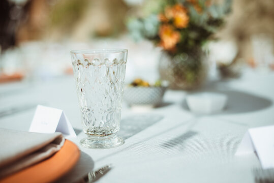 Crystal Glass On A Formal Dining Table With Blank Name Cards