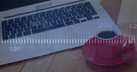 Image of financial data processing over laptop