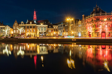 Fototapeta na wymiar Night view of the Haarlem city, water reflection.