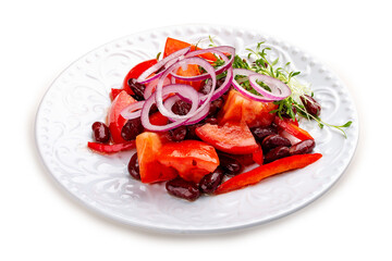 Vegetable salad with tomatoes, beans and onions.