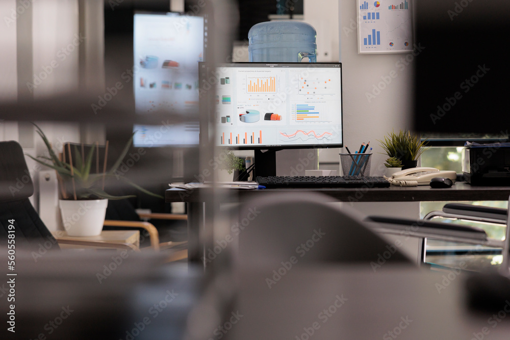 Poster statistical analysis company with financial growth charts on desktop computer screen in the afternoo