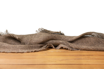 Old wooden table with a piece of burlap