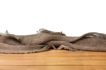 Old wooden table with a piece of burlap
