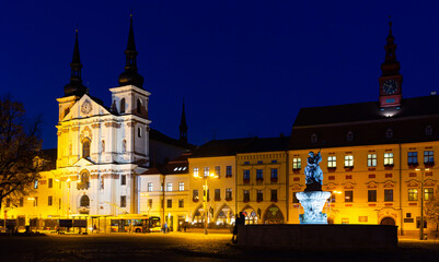 Fototapeta na wymiar Picturesque view of city of Jihlava and Masaryk Square with Saint Ignatius Church at night, Czech Republic
