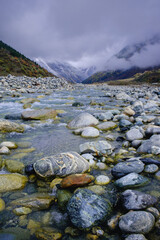 mountain river stone shore